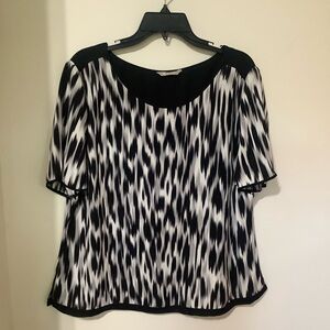 PLANET:  2 Piece Black & White Top/Skirt